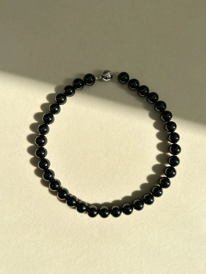 Elegante schwarze Perlenkette mit edlem Charme für Damen Mivona